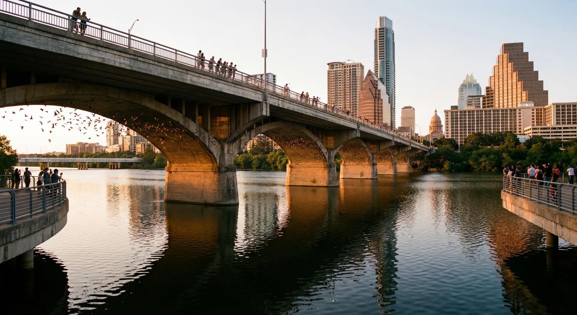Congress Avenue Bridge in Austin at dusk with warm evening light