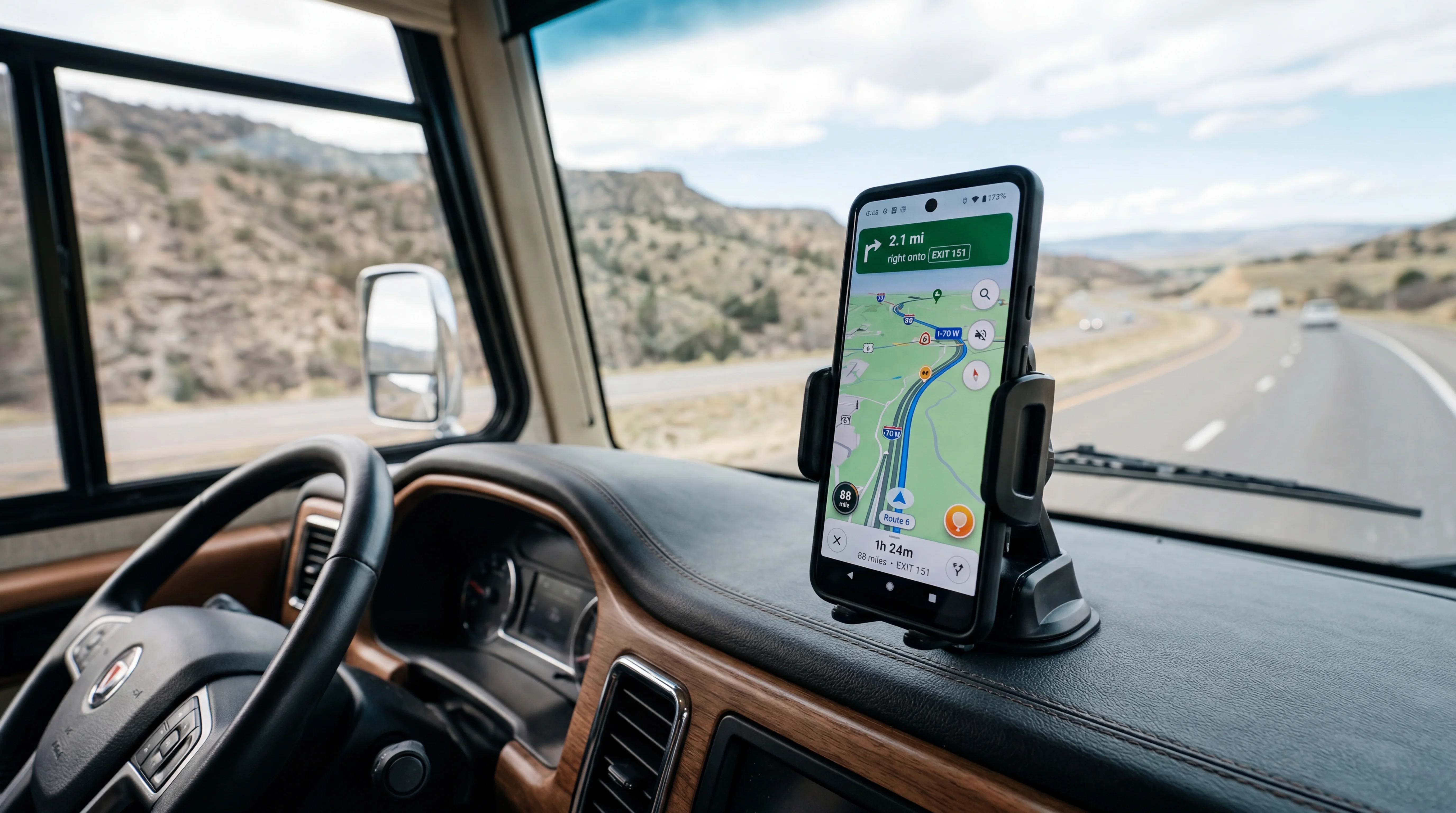 Smartphone displaying RV navigation app with route plotted on screen showing bridge clearance warnings